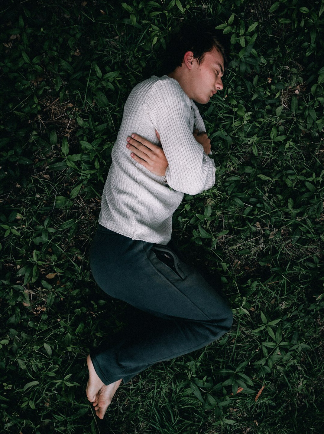 person meditating outdoors